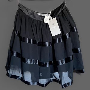 Never worn, new Lipsy London skirt in black.